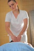 Woman receiving massage photo