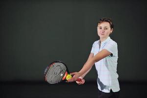 Playing tennis indoors photo