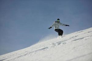 Skiers on mountain photo