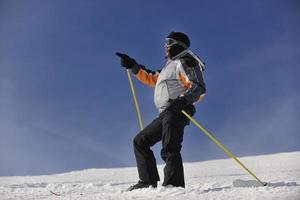 Skier on mountain photo