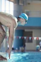 Swimming in indoor pool photo