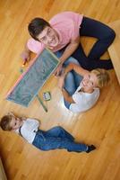 family drawing on school board at home photo