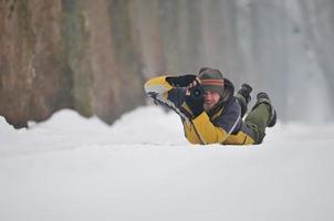 fotógrafo en la nieve foto