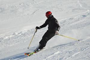 Skiers on mountain photo