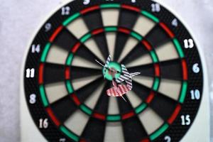 Dartboard game on wall photo