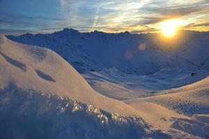 montaña nieve puesta de sol foto