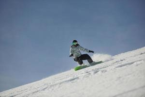 Skiers on mountain photo