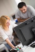 designers in office at the wooden furniture manufacture photo