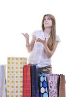 happy young adult women  shopping with colored bags photo