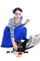 pinup retro  woman with travel bag isolated photo