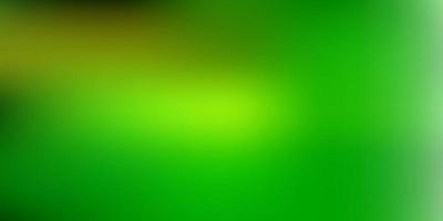 Light green, yellow vector abstract blur backdrop.