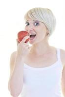 happy  young  woman eat green apple isolated  on white photo