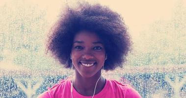 portrait of young afro american woman in gym photo