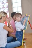 family drawing on school board at home photo