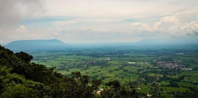 The beautiful natural landscape of a small urban community and fog in the rainy season of Thailand. photo