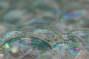 White bath bubbles, white and clear bubbles. photo