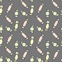 Seamless pattern with candies on gray background. Vector image.