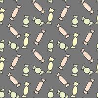 Seamless pattern with candies on gray background. Vector image.