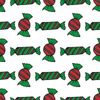 Seamless pattern with cute red and green christmas candies on white background. Vector image.