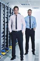 it engineers in network server room photo
