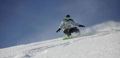 Skiers on mountain photo