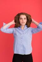 woman playing with her long silky hair photo