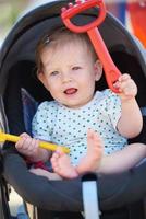 portrait of baby in carriage photo