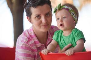 portrait of happy young mother and baby photo