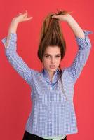 woman playing with her long silky hair photo