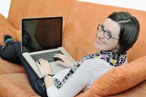 one young woman working on laptop photo