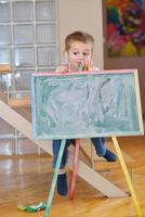 family drawing on school board at home photo