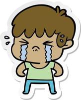 sticker of a cartoon boy crying vector