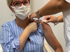 Woman getting vaccinated photo