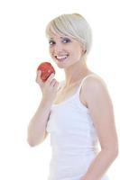 happy  young  woman eat green apple isolated  on white photo