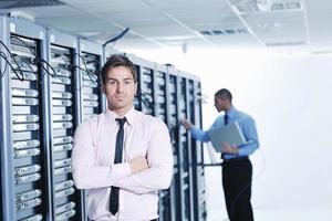 it engineers in network server room photo