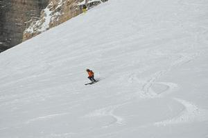 Skiers on mountain photo