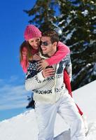 Young Couple In Winter  Snow Scene photo