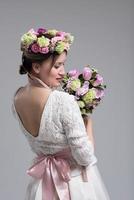 bride with a bouquet  isolated on white background photo