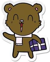 sticker of a happy cartoon bear with gift vector
