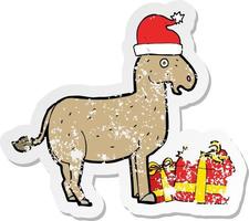 retro distressed sticker of a cartoon christmas donkey vector