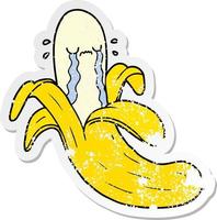 distressed sticker of a cartoon crying banana vector