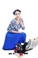 pinup retro  woman with travel bag isolated photo