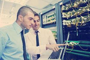 it engineers in network server room photo