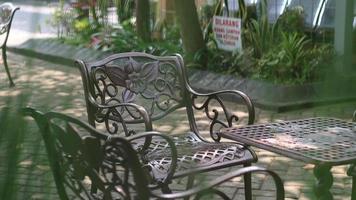 Iron chairs in the park photo