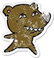 distressed sticker of a cartoon bear showing teeth vector
