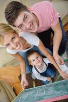 family drawing on school board at home photo