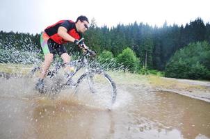 Riding a motocross bike photo