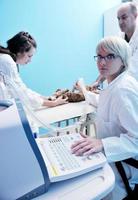 veterinarian and assistant in a small animal clinic photo