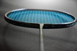Badminton shuttlecocks and badminton rackets photo