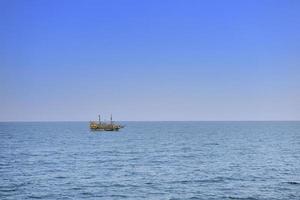 pirate boat ship on sea photo
